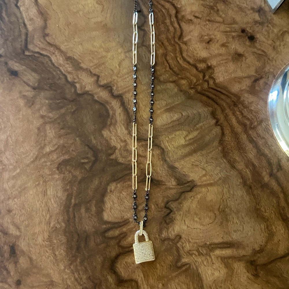 Gold plated and black necklace with gold plated lock and crystals .. nev…